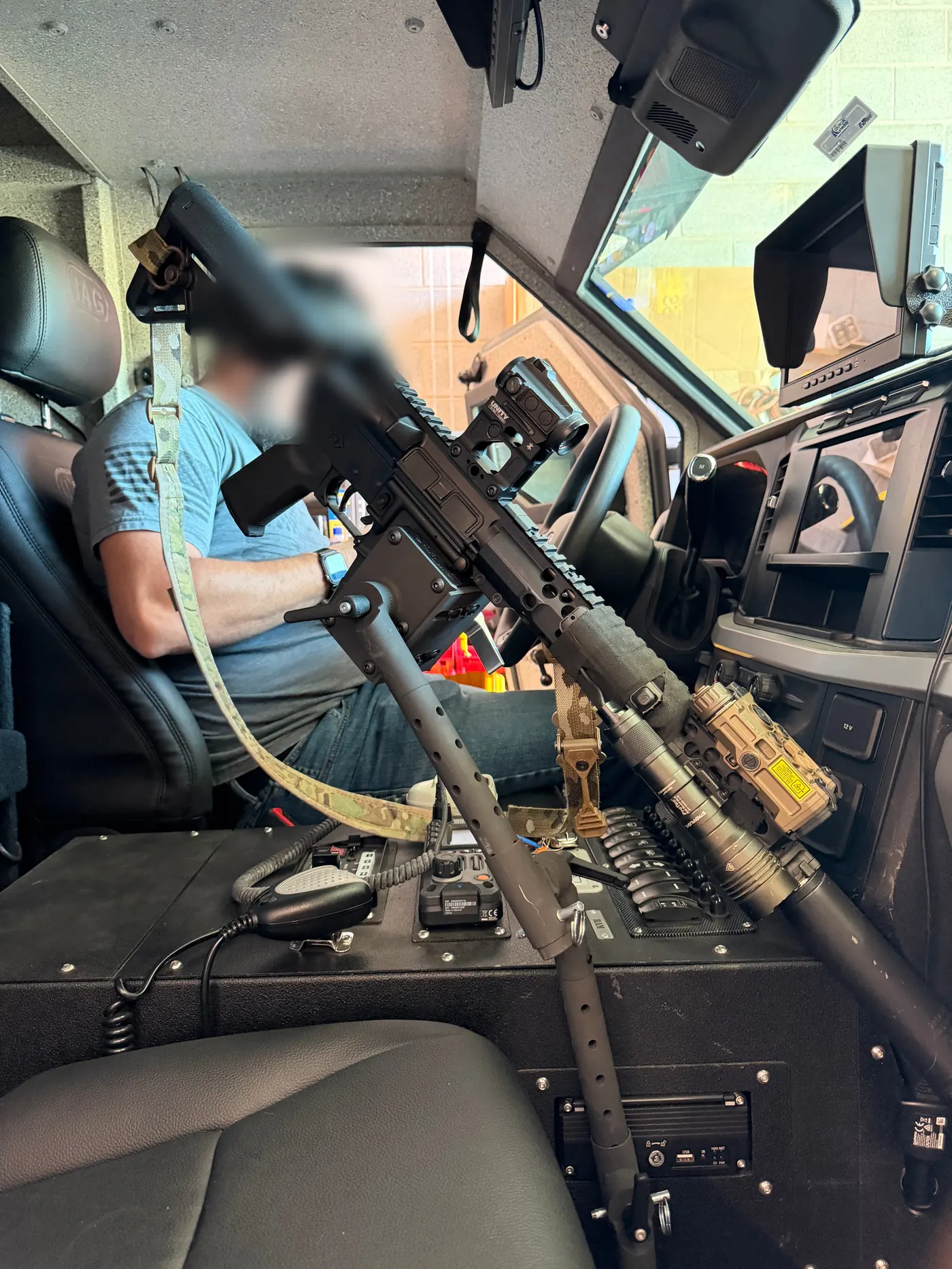 Close-up of a rifle secured in the StandA.R.D. inside an IAG Sentinel cab
