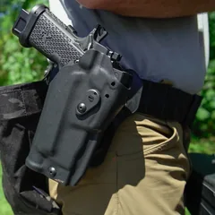 Mid-Drop R.O.E.t8 belt-mounted with pistol holstered, close-up