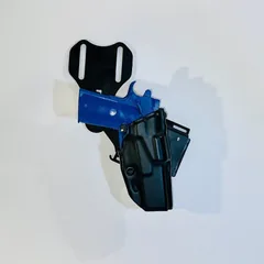 Duty holster with training pistol mounted on the Drop R.O.E.t8, front view